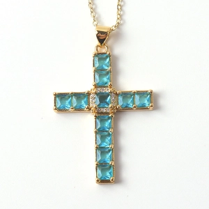 Religious copper cross necklace with sky blue square gems and gold chain for women