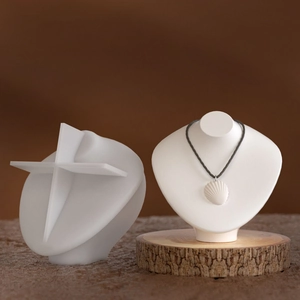 Artistic resin necklace display mold with minimalist white 3D geometric jewelry stands