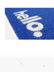 Close-up of durable PVC coil mat featuring hello text with high-elastic dirt-resistant fibers