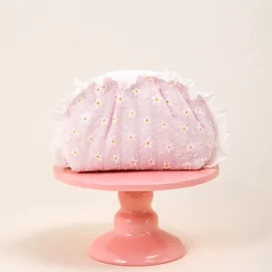 Elegant French style pink daisy makeup bag with white lace trim and floral storage design
