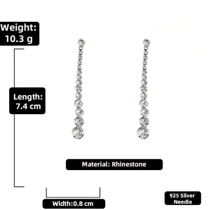 Detailed view of silver long rhinestone drop earrings with 925 silver needle specifications