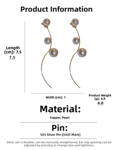 Detail view of 7.5cm long gold tassel earrings with pearls and S925 silver needles