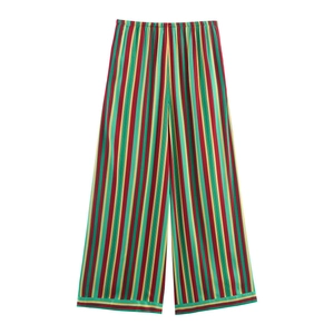 Stylish high-waisted wide-leg striped trousers in green, red, and yellow vertical patterns