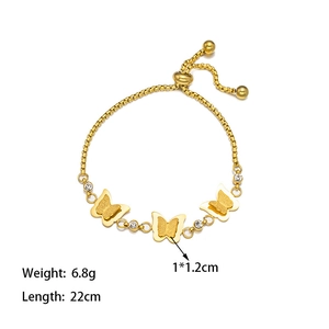 Gold-plated stainless steel butterfly chain bracelet with rhinestone accents and adjustable clasp