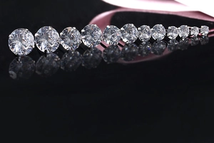 Detailed view of graduated sizes of S925 silver four-prong cubic zirconia stud earrings