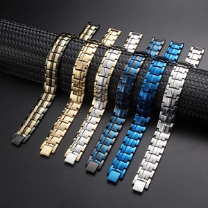 Men titanium steel magnetic therapy bracelets in various colors on a display stand