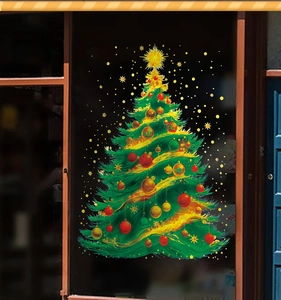 Close-up of a festive Christmas tree static window cling with gold and red ornaments