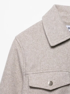Detail shot of oatmeal soft zipper bomber jacket with refined wool texture and collar