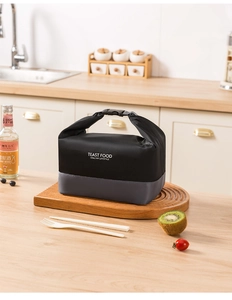 Detail of insulated lunch bag with roll-top buckle and waterproof fabric in kitchen