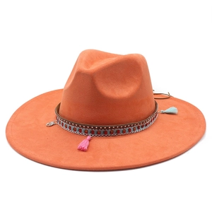 Orange wide brim suede fedora hat with bohemian embroidered ribbon and fringe tassels