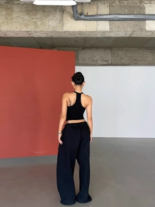 Women's black V-neck athletic backless tank top with matching wide-leg casual pants