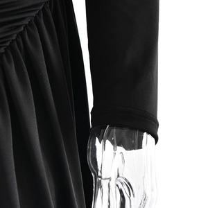 Detail showing elegant black long sleeves with pleated texture on slim-fit dress fabric