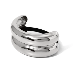 Minimalist silver stainless steel hair tie with a high-polished metallic finish on white back