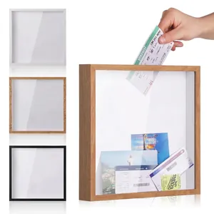 Wooden travel shadow box for tickets and mementos in black white and wood colors