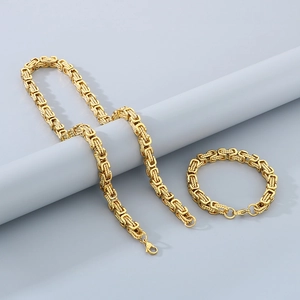 Detail of gold-plated Byzantine chain necklace and bracelet set with lobster clasp