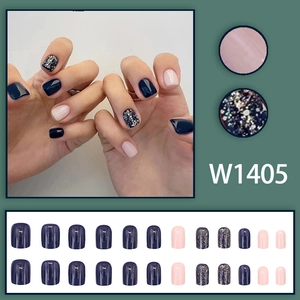 Navy blue starry glitter press-on nail set with light pink accents in various sizes