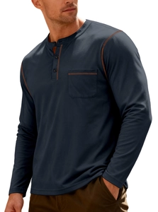 Detail of navy blue Henley shirt with orange contrast stitching and chest pocket