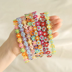 Colorful embroidered daisy headbands for women, set of six floral hair accessories