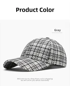 Close-up of grey tweed texture and woven pattern on the stylish baseball cap brim