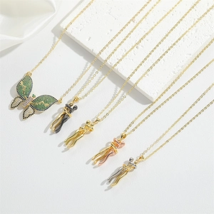 Detail of butterfly and embracing figure pendants with micro-inlaid stones in various plating