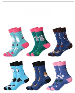 Detailed set of six cotton crew socks with colorful animal patterns and contrast cuffs
