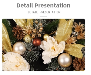 Detail of Christmas wreath with white peonies, golden ribbons, pine cones and snow pine needles