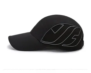 Detail of black breathable mesh baseball cap with side quick-dry fabric and graphic