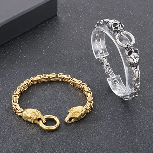 Punk retro skull steel bracelet with hand-woven chain design for men in gold and silver