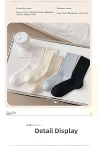 Detail view of five assorted knitted crew socks showing ribbed texture and elasticity