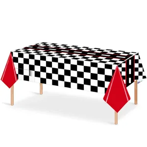 Racing party tablecloth with black asphalt road design and red checkered skirt borders
