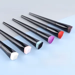Detailed view of 6 colorful angled flat foundation brushes with soft bristles and matte handles