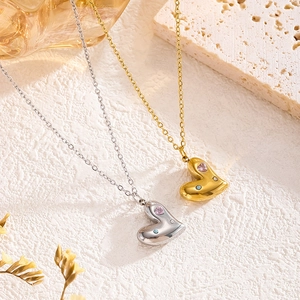 Elegant heart-shaped necklaces in gold and silver with colorful cubic zirconia accents