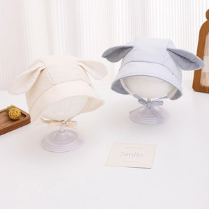 Infant velvet rabbit ear trapper hat with chin straps for warmth and comfort