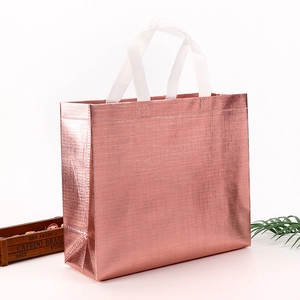 Glossy rose gold laser non-woven shopping bag with sturdy white handles and side gussets