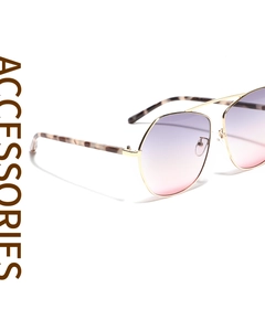 Detail of pilot sunglasses with gold metal frame, purple gradient lenses and tortoise temples