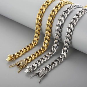 Chunky gold and silver cuban link chains with iced out rhinestone square buckles