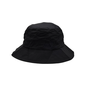 Detail view of the black quick-dry outdoor bucket hat with fine stitching and fabric texture