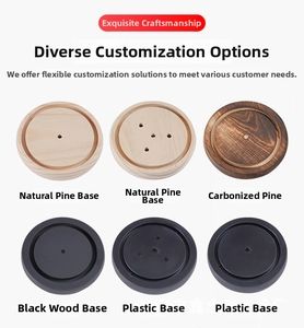 Detail view of round display bases in pine wood, black finish, and plastic materials