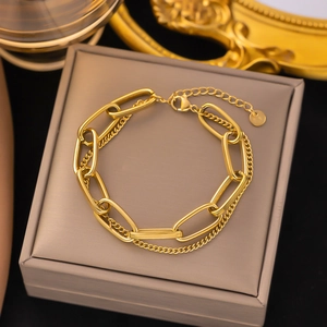 Double-layered 18K gold plated chain bracelet displayed on a luxury jewelry box
