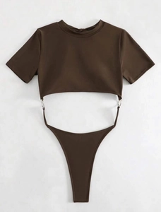 Close-up of chocolate brown bodysuit featuring waist cut-outs and metal ring accents
