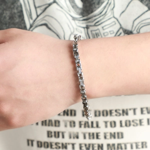 Men's hip hop silver twisted rope chain bracelet in stainless steel worn by model