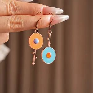 Vintage enamel asymmetric drop earrings with bronze metal hooks and colorful beads