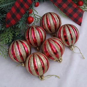 Set of 6 red and gold glitter striped Christmas ornaments with hanging strings and pine decor
