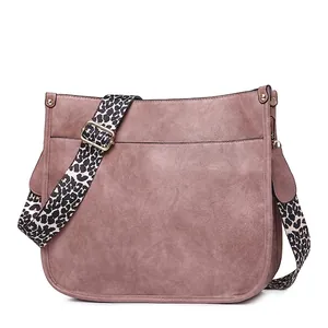 Brown faux leather tote bag with stylish leopard print adjustable shoulder strap