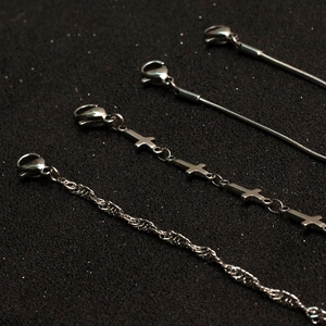 Minimalist stainless steel necklace set with cross pendant and snake chain in silver finish