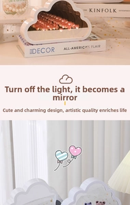 Detailed cloud-shaped tulip night light showing mirror effect and pink flower reflection