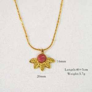 Detail shot of leaf pendant necklace with pink stone including 16x20mm dimensions