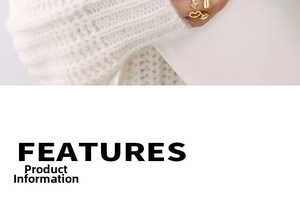 Detailed view of U-shaped gold wave ring featuring heart and geometric cylinder design