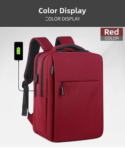 Detail view of red business backpack with external USB charging port and multi-layer zipper