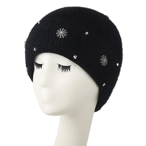 Women's black knit winter beanie with silver rhinestone snowflakes and cozy thermal lining